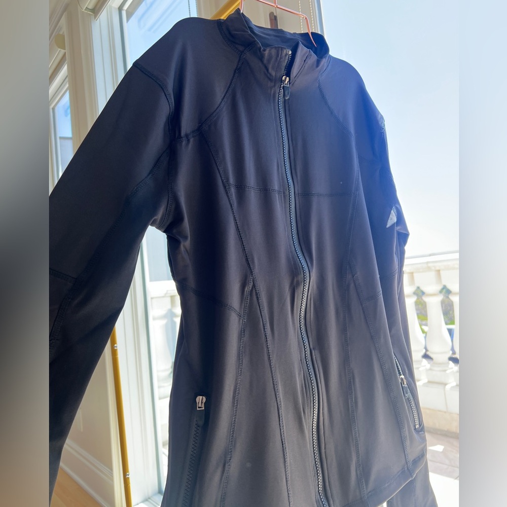 New zip up jacket. Comes in multiple sizes
